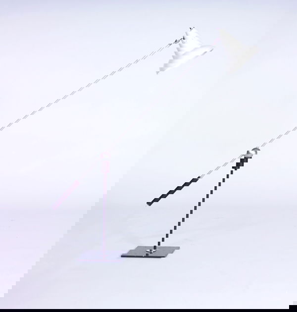 GILBERT WATROUS/HEIFETZ Floor lamp, its single arm: GILBERT WATROUS/HEIFETZ Floor lamp, its single arm with perforated white enameled metal shade magnetically-balanced on black enameled steel base. (A very rare mid-century lamp, purchased by the consig