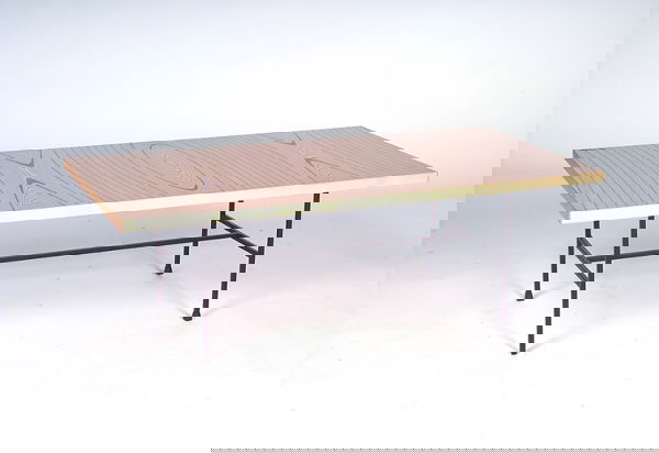 TAPIO WIRKKALA/ASKO Fine coffee table with rectang: TAPIO WIRKKALA/ASKO Fine coffee table with rectangular laminated plywood top on angular black iron frame with stretcher. One missing rubber foot. Marked with brass plaque, "Tapio Wirkkala/Asko/Made in