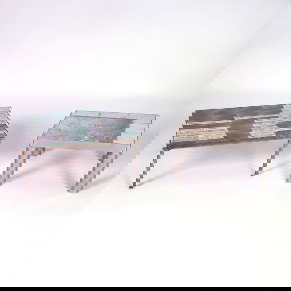 ROGER CAPRON, etc. Two tile-top tables: one by R.: ROGER CAPRON, etc. Two tile-top tables: one by R. Capron with flowers in shades of blue, green and mauve; the other with one large tile surrounded by six smaller ones in white, mottled beige and brown