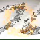 1148: CURTIS JERE Wall-hanging mirror, 1970, its border