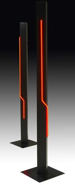 GEORGE KOVACS, INC. Pair of black metal floor lam: GEORGE KOVACS, INC. Pair of black metal floor lamps, identical to preceding. 72 3/4" x 14" sq.