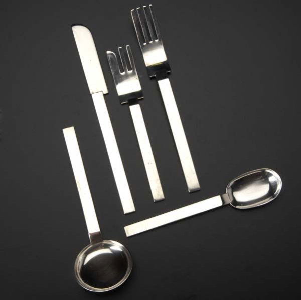 RUSSEL WRIGHT Set of silver-plated flatware for ei: RUSSEL WRIGHT Set of silver-plated flatware for eight, with dinner and salad forks, dinner knives, dinner and soup spoons, designed 1933, produced 1987. Missing one salad fork. Stamped MMA 1987 Korea.