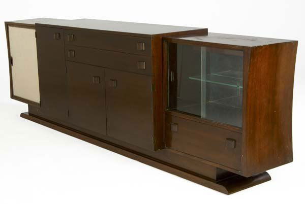 GILBERT ROHDE Custom-designed three-piece bar/cabi: GILBERT ROHDE Custom-designed three-piece bar/cabinet, the center piece with drawers and single shelf, flanked by an illuminated cabinet with sliding glass doors, and by a bar with leatherette-covered