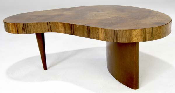 GILBERT ROHDE / HERMAN MILLER Cloud coffee table w: GILBERT ROHDE / HERMAN MILLER Cloud coffee table with exotic wood veneer top, and leatherette-covered supports. 15 1/2" x 41" x 31"