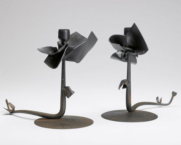 ALBERT PALEY Pair of Tuft candleholders in forged: ALBERT PALEY Pair of Tuft candleholders in forged and formed steel, 1993. Stamped ALBERT PALEY 1993. 8 1/2" x 9 1/2"