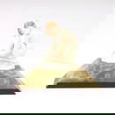 277: Ivory female figure on marble and basalt base. Uns