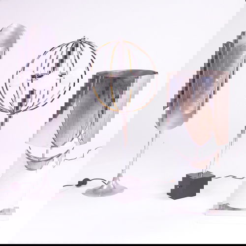 Three chrome table lamps, one designed by Karl Spr: Three chrome table lamps, one designed by Karl Springer. Scratches. Unmarked. Tallest: 52"