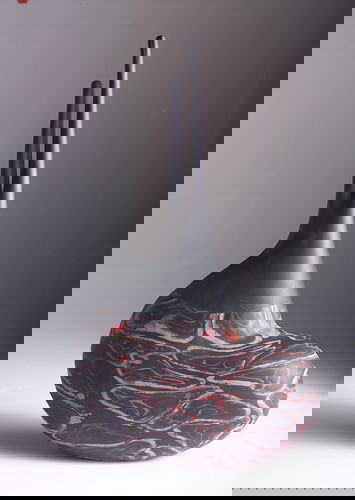 DAVIDE SALVADORE Asymmetric glass vessel, 2000, wi: DAVIDE SALVADORE Asymmetric glass vessel, 2000, with matte black top and marbelized pattern in gray and reddish-orange on kidney-shaped base. Acid-etched "Davide Salvadore/Murano/2000" 16 1/2" x 9 1/2