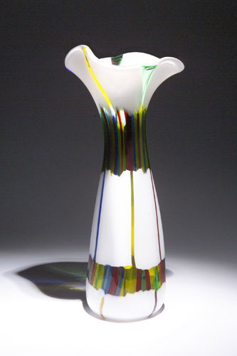 ANSOLO FUGA/AVEM Fine and large patchwork vase wit: ANSOLO FUGA/AVEM Fine and large patchwork vase with floriform rim composed of blue, green, yellow and red canes on lattimo ground. Unmarked. 18 3/4" x 8 1/2"