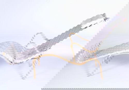 BRUNO MATHSSON/KARL MATHSSON Early chaise lounge w: BRUNO MATHSSON/KARL MATHSSON Early chaise lounge with oatmeal-colored webbing, and attached headrest, on laminated bentwood frame. Bruno Mathsson/Karl Mathsson labels. 36 1/4" x 24 1/2" x 53 1/2"