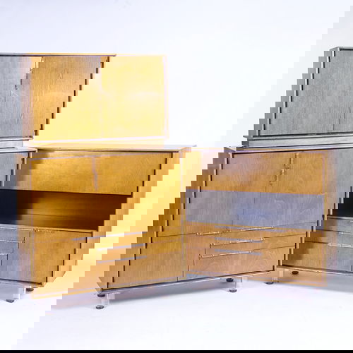 GILBERT ROHDE/HERMAN MILLER Three inlaid walnut ca: GILBERT ROHDE/HERMAN MILLER Three inlaid walnut case pieces consisting of a chest/desk, a low cabinet, and a utility chest, all with plexglas pulls and legs. Two have stenciled nos. Utility chest: 38