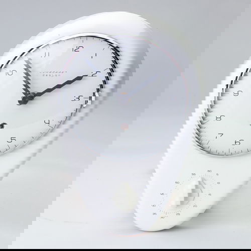 MAX BILL/JUNGHANS White ceramic kitchen clock with: MAX BILL/JUNGHANS White ceramic kitchen clock with timer. Marked "Junghans Design" on dial. 9 3/4" x 6 1/2"