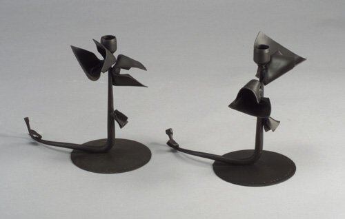Pair of ALBERT PALEY forged and fabricat: Pair of ALBERT PALEY forged and fabricated steel "Tuft" candlesticks, 1993, with black patina. Stamped Albert Paley/1993. 9" h