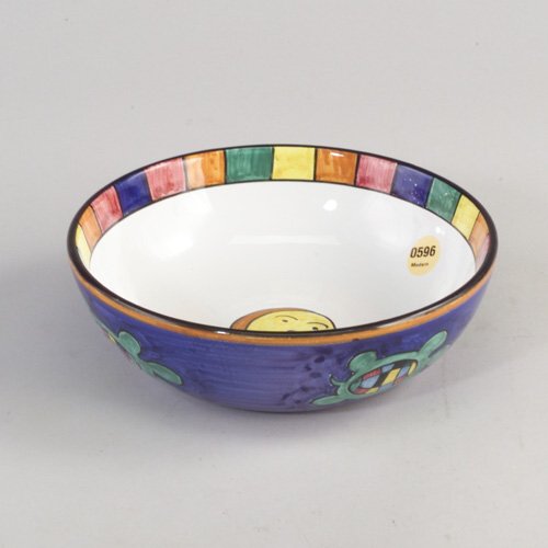 JOHN O'KULICK ceramic "Faces" bowl, 1991: JOHN O'KULICK ceramic "Faces" bowl, 1991, its interior decorated with a whimsical face and band of polychrome squares against a white ground, its exterior decorated with tortoises. Signed and dated. 2