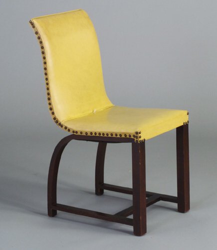 GILBERT ROHDE for HEYWOOD-WAKEFIELD side: GILBERT ROHDE for HEYWOOD-WAKEFIELD side chair with continuous-form seat upholstered in tacked-on yellow vinyl, and wood base with rounded rear legs. Split to upholstery along inner seam of seat. Heyw
