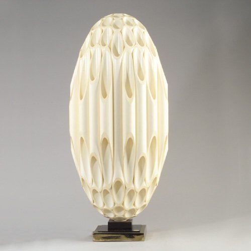 Large ROUGIER ovoid table lamp comprised: Large ROUGIER ovoid table lamp comprised of molded plastic cylinders mounted on a square brass and resin base. Rougier metal tag. 30 1/2" x 12 3/4"
