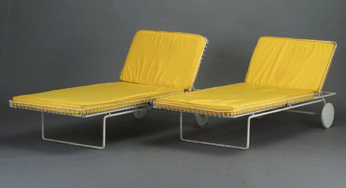 Two RICHARD SCHULTZ for KNOLL white wire: Two RICHARD SCHULTZ for KNOLL white wire chaise lounges on tubular white enameled frames with circular rear wheels and bright yellow fabric cushions. Unmarked. 32" x 29 1/2" x 74"