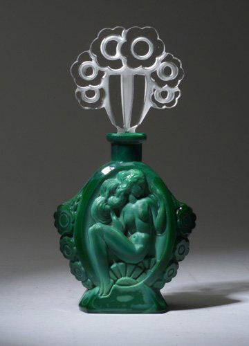 INGRID perfume bottle, circa 1920s, in op: INGRID perfume bottle, circa 1920s, in opaque green crystal with clear and frosted stopper. Ht. 6 1/2 in (16.3 cm)