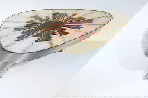 ROGER CAPRON (Attr.) Three-sided tile-top coffee t: ROGER CAPRON (Attr.) Three-sided tile-top coffee table with stylized sunburst motif in shades of brown on a light beige ground, with matte chrome trim and legs. Top signed illegibly. 12 1/2" x 34 1/2"