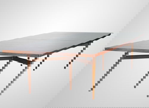 ARNE VODDER/SIBAST MOBLER Large rosewood dining t: ARNE VODDER/SIBAST MOBLER Large rosewood dining table, 1950s, with boat-shaped top on two V-shaped supports with tapering dowel legs. Stenciled 2 63. 28 1/2" x 130" x 56 1/2"