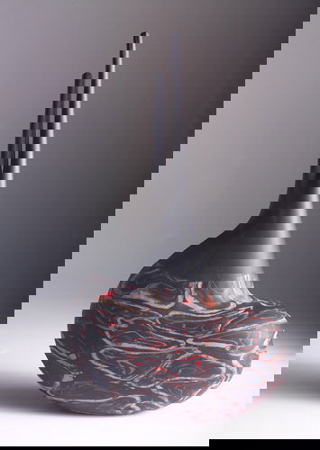 DAVIDE SALVADORE Organically-shaped matte black gl: DAVIDE SALVADORE Organically-shaped matte black glass vase with a grey and orange marbleized kidney-shaped base, 2000. Acid-etched "Davide Salvadore/Murano/2000" 16 1/2" x 9 1/2"