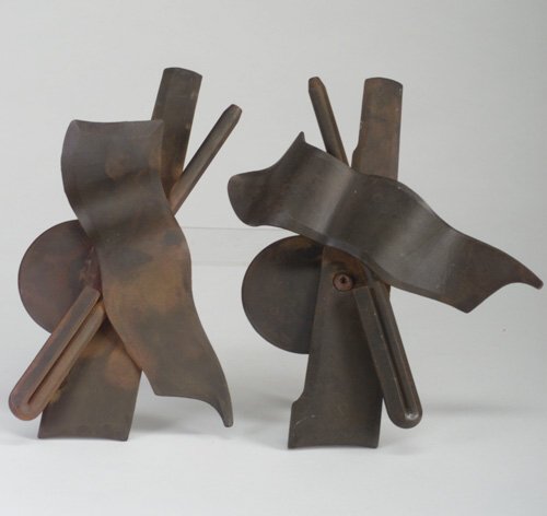 ALBERT PALEY Pair of large medallions of: ALBERT PALEY Pair of large medallions of forged and fabricated steel with rust-colored flashes. (From the Peter Joseph estate, these medallions were utilized as door handles in his Rosecliff offices.)