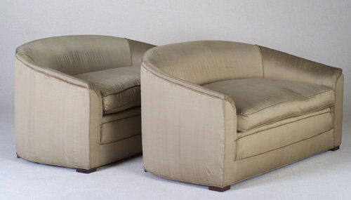 EDWARD WORMLEY Pair of early DUNBAR cont: EDWARD WORMLEY Pair of early DUNBAR contoured settees, 1940s, each with frame and loose seat cushion upholstered in taupe-colored silk, on low wood feet. (An excellent Wormley design.) Unmarked. 28" x