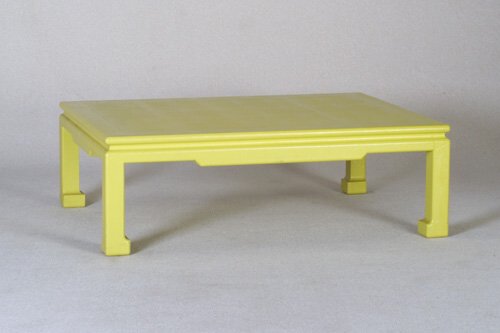 KARL SPRINGER Coffee table with rectangu: KARL SPRINGER Coffee table with rectangular top, drop apron, and bracket feet, covered in bright yellow snakeskin finish. Unmarked. 15 1/2" x 47 3/4" x 35 3/4"