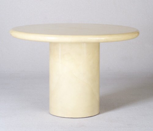 KARL SPRINGER Pedestal dining table with: KARL SPRINGER Pedestal dining table with circular top and cylindrical base, entirely covered in lacquered goatskin. Unmarked. 29 1/4" x 43 1/4" dia.