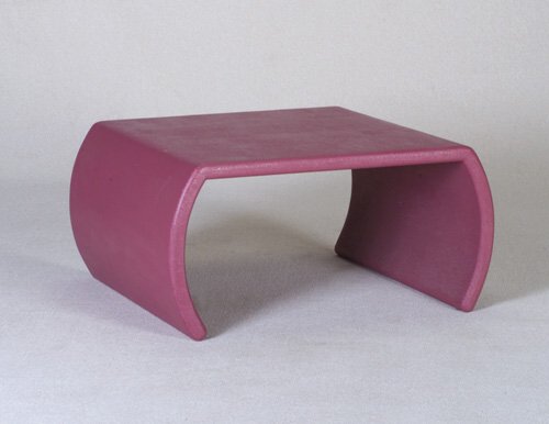 KARL SPRINGER Coffee table with square t: KARL SPRINGER Coffee table with square top and curving sides, entirely covered in textured raspberry finish. Unmarked. 17" x 34 1/2" x 30"