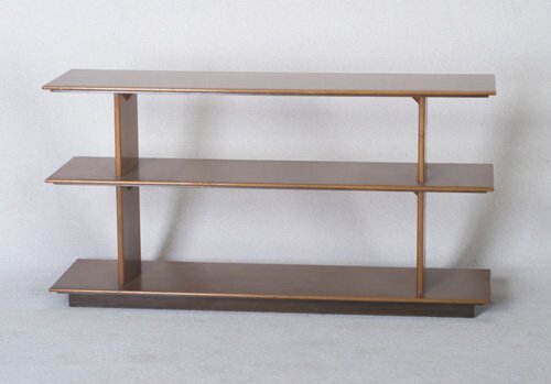 GILBERT ROHDE HERMAN MILLER three-tiered: GILBERT ROHDE HERMAN MILLER three-tiered open bookshelf unit on plinth base. Stenciled numbers. 28" x 54" x 15"