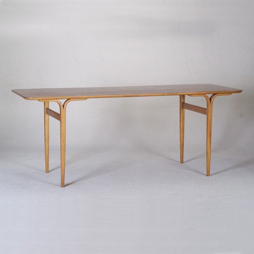 BRUNO MATHSSON: Table with rectangular walnut-veneer top on laminated Y-shaped legs with side stretchers. Bruno Mathsson paper labels. 27 1/2" x 70 3/4" x 27 1/4"