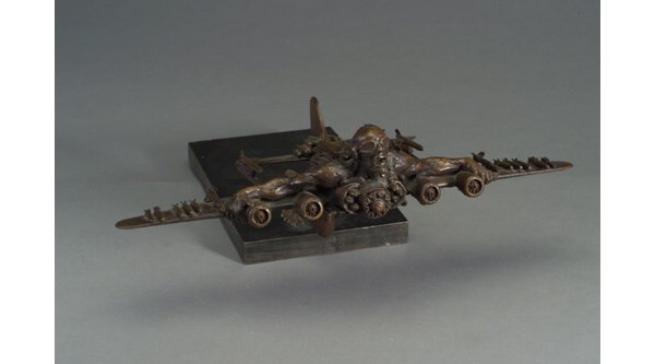 AL FARROW bronze sculpture, "Study no. 4: AL FARROW bronze sculpture, "Study no. 4 for Icarus", 1984, depicting a naked man straddling the top of an airplane laden with bombs and missiles, asymmetrically-mounted on a rectangular steel base. (