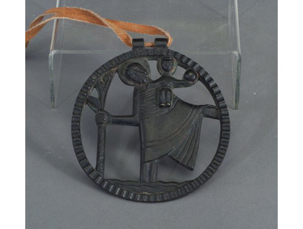 Fine JEAN LAMBERT RUCKI (1888-1967) bron: Fine JEAN LAMBERT RUCKI (1888-1967) bronze medallion depicting St. Christopher with the Christ child on his shoulder holding an orb. Signed J.L. Rucki. 4 1/4" dia.