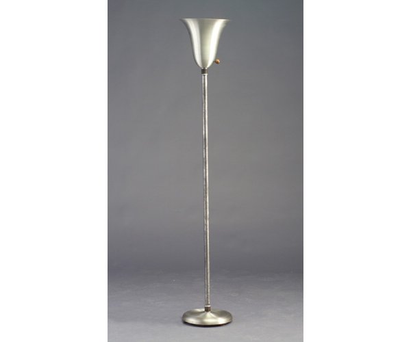 RUSSEL WRIGHT spun aluminum torchére wit: RUSSEL WRIGHT spun aluminum torchére with trumpet shade and wooden knob switch. Some dents to base. Unmarked. 64 3/4" x 11 1/4"