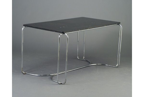 WOLFGANG HOFFMANN for HOWELL dining tabl: WOLFGANG HOFFMANN for HOWELL dining table with black-enameled rectangular top on bright chrome tubular base. Minor scratches and chipping to enamel. Howell decal. 28 1/2" x 58 1/2" x 33 3/4"