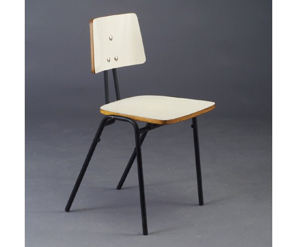 ROBIN DAY stacking chair with white form: ROBIN DAY stacking chair with white formica seat and riveted back on black metal base. (Originally designed for the 1951 Festival of Britain, distributed by JG Furniture of New York). JG Furniture sta