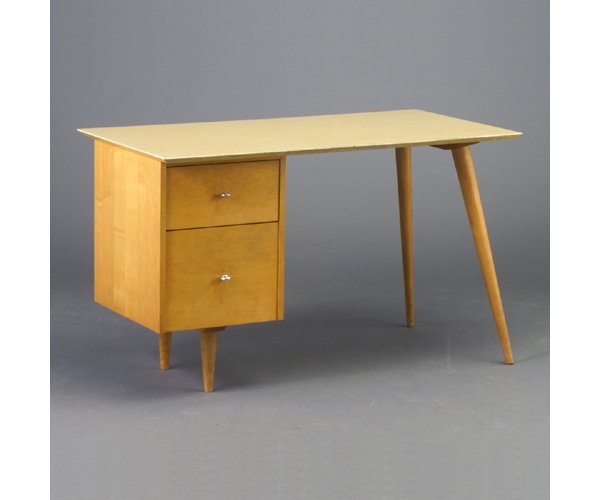 PAUL McCOBB for WINCHENDON "Planner Grou: PAUL McCOBB for WINCHENDON "Planner Group" single-pedestal blond-wood desk with rectangular woodgrain-laminate top, two drawers with bright chrome ring pulls, on two flaring dowel legs. Light wear to