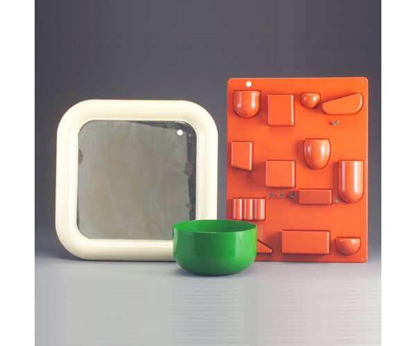 Three assorted plastic pieces: ANNA CAST: Three assorted plastic pieces: ANNA CASTELLI for KARTELL "7106" large green serving bowl; SERGIO MAZZA for ARTEMIDE "Delfo" wall mirror with white frame; and early DOROTHEE MAURER BECKER for DESIGN M