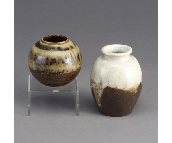 Two CARL HALIER for ROYAL COPENHAGEN vas: Two CARL HALIER for ROYAL COPENHAGEN vases: one spherical covered in mottled brown, black and taupe glazes, the other ovoid in chocolate brown and ivory crackled glaze. One stamped Royal Copenhagen/ D