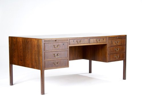 ARNE VODDER Rosewood eight-drawer partner's desk.: ARNE VODDER Rosewood eight-drawer partner's desk. 29" x 65 1/2" x 33 1/4"