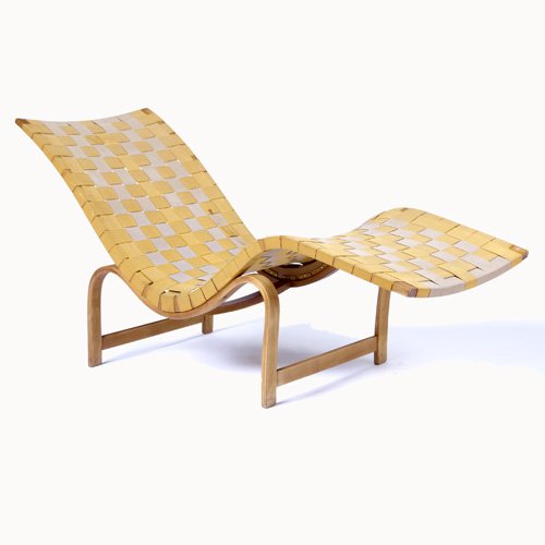 BRUNO MATHSSON Lounge chair with gold and umber w: BRUNO MATHSSON Lounge chair with gold and umber webbing on laminated bentwood frame. 30 1/2" x 21" x 60"