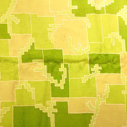 EDWARD FIELDS Room-size wool rug of green geometr: EDWARD FIELDS Room-size wool rug of green geometric interlocking forms outlined in white. Signed Edward Fields. 92" x 164"