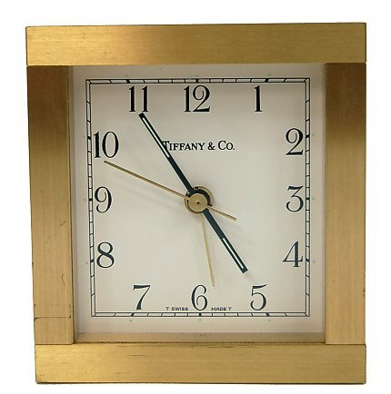 Tiffany & Co. brass alarm clock: Tiffany & Co. brass alarm clock with quartz movement, measuring 3.5" x 3.25", running and keeping good time