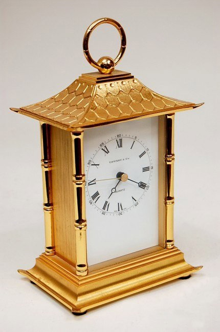 Tiffany & Co. Pagoda mantle clock: Tiffany & Co. solid brass quartz Pagoda mantle clock measuring 7.75" tall