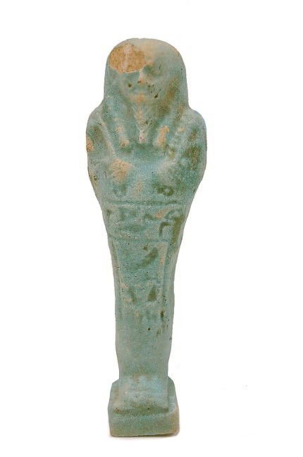 Egyptian blue faience mummiform ushabti: Egyptian blue faience mummiform ushabti with wig and crossed arms holding pick and hoe, having a loss to head measuring 4.4", late period c.664-300 B.C. Provenance: ex. Bethel Collection, England, est