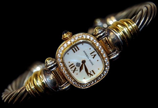 David Yurman diamond bezel 18K sterling watch: David Yurman diamond bezel Swiss sterling cable watch with 18K case, mother of pearl face, the 18K bezel set with 35 round diamonds, excellent condition, running and keeping good time, retailed at ove