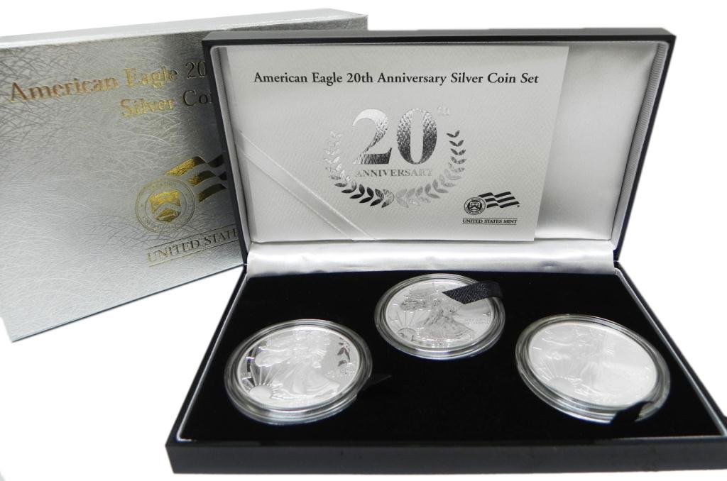 2006 Silver American Eagle 20th Anniversary Coins: 2006 Silver American Eagle 20th Anniversary three piece coin set, one proof from West Point Mint, one uncirculated from West Point Mint, one reverse proof from Philadelphia Mint, original box with C.O