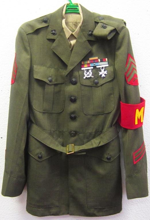 U.S. Marine Corp Korean-era Sergeant's uniform: U.S. Marine Corp Korean-era Sergeant's uniform; complete with shirt, pants, jacket and hat. Includes all insignia badges and campaign bars, mint condition.