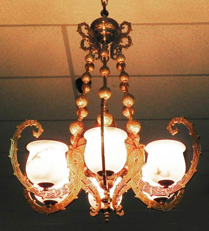 Contemporary 6-light chandelier alabaster shades: Contemporary 6-light chandelier with alabaster carved stone shades, gothic patterns in brass, measuring 32" x 24", excellent condition